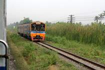 NKF 1232 am 13.M�rz 2011 als ORD von Sala Ya nach Bangkok kurz vor der Hst. Phuttamonthon Sai 2.