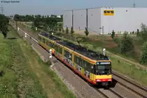 Wagen 807 und Wagen 833 unterwegs als S31 nach Karlsruhe Hbf. Aufgenommen am 25.05.2011 bei Malsch. Der vordere Triebwagen wirbt seit der Inbetriebnahme der Strecke W�rth-Germersheim zur S-Bahn (12/2010) f�r das M�belkaufhaus Nolte in Germersheim, das �ber die S-Bahnstation Germersheim S�d/Nolte nun bestens mit der S-Bahn zu erreichen ist.