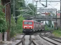 114 004 zog,am 28.Mai 2011,den RE von Ludwigsfelde nach Wismar.Hier fuhr der Zug in den Bahnhof Schwerin.