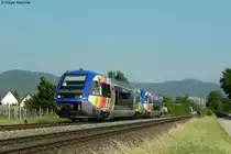 Im ersten Halbjahr 2011 gab es immer Sa und So auf der pf�lzischen Maximiliansbahn ein durchgehendes Zugspaar von Neustadt (W) Hbf bis nach Strasbourg �ber Landau, Winden, Wissembourg, Soultz-sous-For�ts, Haguenau, Bishwiller. Am 03.06.2011 verl�sst der Blauwal X 73906 zusammen mit X 73909 den Haltepunkt Edesheim (Pfalz) als RB 18811 nach Wissembourg. Ab Wissembourg f�hrt der Zug dann nach kurzem Aufenthalt weiter als RE 30543 nach Stra�bourg.