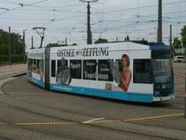 Von der Hamburger Stra�e konnte ich,am 28.Mai 2011,den Rostocker Stra�enbahntriebwagen 678 im Depot,mit Werbung f�r die Mecklenburg-Vorpommernzeitung,fotografieren.