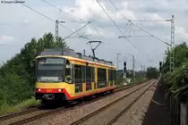 Wagen 851 mit Werbung  mobility 4u - deine pers�nliche Freiheit  erreicht am 07.06.2011 als S5 nach W�rth den Haltepunkt Maximiliansau West. Das Bild entstand vom Bahnsteigende.