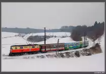 Mariazellerbahnwinter: 1099 011 mit R 6809 schl�ngelt sich durch die Kurven bei Matzendorf am sehr kalten und windigen 13.2.2010