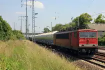 155 116-7 am 06. Juni  2011 vor einem Ganzzug mit Zementstaubsilowagen nach der Durchfahrt durch den Bahnhof Berlin Sch�nefeld Flughafen 