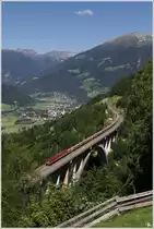 1144 093 und 1144 062 fahren mit einem Sandzug von Villach nach Schwarzach-St. Veit. 
Falkensteinbr�cke Obervellach 28_6_2011