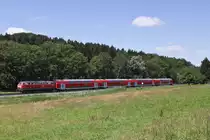 Nach Aulendorf f�hrt die Strecke der S�dbahn durchs Schussentobel, wo 218 436 mit dem IRE 4225 (Stuttgart Hbf-Lindau Hbf) unterwegs ist. (26.Juni 2011)