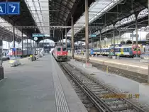 7.3.2010 in Basel SBB mit zwei Re 4/4 und einer NPZ 