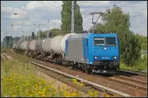 Am 19.07.2011 ist 185 523-8 mit Kesselwagen Richtung Karower Kreuz unterwegs. F�r welches EVU war bis zum Aufnahmetag nicht klar, vermutet wird HGK.