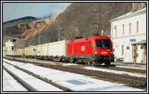 Der t�gliche Hackschnitzelzug f�r die Firma SAPI in Gratkorn wurde am 7.3.2006 von 1016 014 bespannt, und wurde bei der Durchfahrt in Peggau-Deutschfeistritz fotografiert.