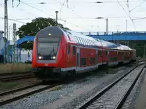 Mit Dostos vom Hanseexpress und 112 111 als Schublok fuhr RE 13016 Sassnitz-Rostock,am 16.August 2011,in den Bahnhof Bergen/R�gen.