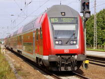 RE 5 (RE 18511 ) mit  Schublok 112 186 nach Falkenberg(Elster) am 04. September 2011 bei der Einfahrt in den Bahnhof Trebbin zur Weiterfahrt nach Woltersdorf/Nuthe-Urstromtal.