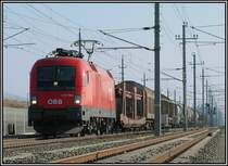 1116 159 im Bereich Kalsdorf S�d am 20.3.2006 mit einem G�terzug von Spielfeld kommend, bei nicht gerade optimalem Sonnenstand.
