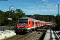 Angef�hrt von einem Wittenberger Steuerwagen und geschoben von 143 882-9 passiert der RE 4933 (Stuttgart-W�rzburg �ber Neckarelz) nonstop den Hp Zimmern bei Seckach. Aufgenommen am 10.09.2011.