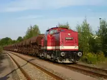 112 565-7 steht am 11.09.11 mit einem Schotterzug in Falkenstein. Den sie in 2 Teilen von Plauen nach Falkenstein fuhr.