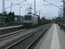 Zusammen mit einer V100,von KubeCon,kam der f�r Raildox fahrende Taurus ES64U2-102 am 12.September 2011 durch Bergen/R�gen,um Holz von Mukran nach Niederg�rne zuholen.