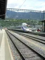 Hier f�hrt ein ETR 610 der FS am 6.8. in den Bahnhof von Brig ein. 