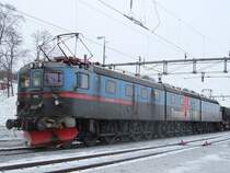 Dm3 1229/1244/1230  Rektorn  mit Leerzug nach Kiruna am 17.03.2006 in Bj�rkliden.