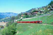 RhB Schnellzug 35 von Landquart nach Davos Platz am 10.05.1998 oberhalb K�blis mit E-Lok Ge 4/4 II 618 - D 4216 - A 1231- B 2433 - B 2435 - B 2364 - B 2363.
