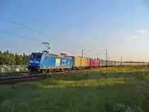 Press 145 030-7 (145 096-1) zieht einen Holzsp�nezug am 04.10.2011 bei Wagh�usel in Richtung Mannheim

