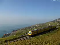 Nicht an der C�te-d'Azur, sondern im Lavaux befindet sich am 3.10.2011 der Train de Vigne obehrlab von St.Saphorin. Jedoch k�nnte man aufgrund des dunstigen Wetters meinen, der Zug befinde sich am Mittelmeer, statt am Genfersee.