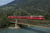 Be 4/4 513 �berquert am 2.9.11 mit einer S 2 den Hinterrhein bei Reichenau-Tamins.