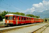 RhB Regionalzug 844 Vorortpendelzug von Chur nach Landquart am 06.09.1996 in Untervaz mit Triebwagen Be 4/4 516 - B 2413 - ABDt 1716. Hinweis: 3-teiliger Pendelzug vor Modernisierung.
