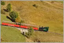 Oberhalb der Planalp f�hrt Lok 16 mit einem Leerzug Richtung Brienzer Rothorn. (01.10.2011)
