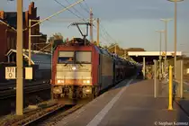 185 602-0 Crossrail mit einem Fiat Autotransportzug. Der Zug musste wegen �berholung des EC 174 in Rathenow einen kleinen Stop einlegen. 13.10.2011