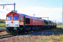 Drei Class 66 DE6314  Hanna  von Crossrail der Lokf�hrer  startet den Motor und die PB15 von Ascendos Rail Leasing und die DE6312  Alix  von Crossrail stehen abgestellt in Montzen-Gare.
29.10.2011
