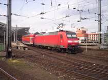 146 009-6 schiebt den RE 1  NRW-Express  von Hamm(Westf) nach AAchen Hbf in den K�lner Hbf am 11.04.2006
