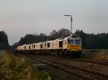 Die 247 043 mit der 247 053 und der 247 047 am 11.11.2011 mit einem Gaskesselzug bei der Einfahrt in T��ling.