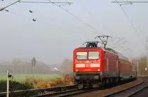 112 162 am 23.11.11 bei �bach - Palenberg als RE 4 nach Aachen, im Dunst des Wurmtal.