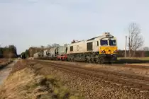 Mit einem weiteren M�llzug durchf�hrt 247 060-7 am 08.12.11 den Bahnhof T��ling.