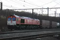 Die Class 66 DE6311  Hanna  von Crossrail f�hrt mit einem Containerzug von Montzen nach Aachen-West.
10.12.2011
