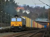 DE 6302 von Crossrail am 11.12.2011 mit einem Containerzug auf der Rampe von Aachen West nach Belgien.