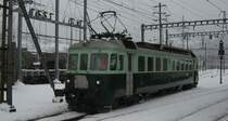 Der historische BN Triebwagen Be 4/4 761,  Wellensittich , auf dem Weg von Brig nach Sierre. Brig, 21.12.2011.