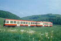 WB Regionalzug 45 von Waldenburg nach Liestal am 08.05.1993 bei Bad Bubendorf mit Steuerwagen voraus Bt 116 - Triebwagen BDe 4/4 16.
