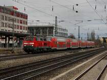 Die 218 400 mit einer RB nach M�nchen am 04.12.2011 bei der Durchfahrt am Heimeranplatz (M�nchen). 
