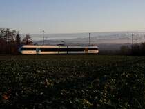 R 25868 von Weinfelden nach Konstanz f�hrt am 26.12.2011 bei Berg (TG) den weiten Bogen den Seer�cken hinauf.