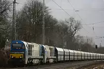 HGK DH 751+HGK DH 58 am 30.12.11 mit einem leeren Quardsandzug auf dem Weg nach Haltern-Sythen bei der Durchfahrt durch Ratingen-Lintorf.
