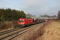 1116 109 mit einem Autozug am 28.12.2011 bei Gro�karonlinenfeld.