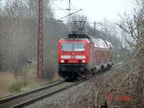 RE9 mit 143 210-3 aus Sassnitz nach Rostock Hbf kurz vor seinem n�chsten Halt in Sagard. 30.4.06