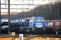 Nochmal die V206 von der Rurtalbahn steht in Montzen-Gare(B) mit einem Autozug bei sch�nem Winterwetter am 15.1.2012.