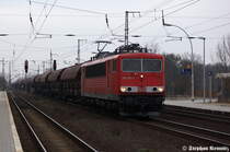 155 261-1 mit einem Getreidezug in Priort. Ziel des Zuges k�nnte Wismar oder Rostock sein. 27.01.2012