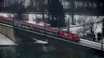 1216 016 mit EC 88  DB-�BB EuroCity  (Verona Porta Nuova-M�nchen Hbf) in Brixlegg.(29.1.2012)