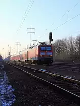 114 012-8   mit dem RE 3 (RE 18313) nach Elsterwerder am 02. Februar 2012 zwischen Bahnhof Berlin-Lichterfelde Ost und dem Bahnhof  Blankenfelde(Teltow-Fl�ming) bei km 24.2 auf dem s�dlichen Berliner Au�enring bei Diedersdorf. 