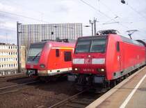 146 011-2 neben einer S-bahngarnitur der S11.