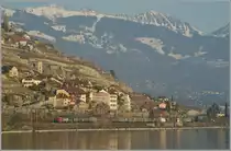 Die SBB Ae 6/6 610 496-2  Stadt Wil  mit einem G�terzug Richtung Lausanne bei St-Saphorin am 1. M�rz 2012