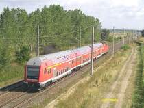 Eine RB auf dem Weg nach Leipzig Hbf, hier zwischen Lutherstadt Witenberg und Bergwitz (im Hintergrund sieht man die Elbbr�cke in Lutherstadt Wittenberg) 