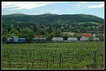 2170 001-8 bei der R�ckfahrt ihrer BED 71395 mit den leeren Zementwaggons von Waldm�hle kommend Richtung Wien-Liesing, aufgenommen in Perchtoldsdorf a, 19.5.2006